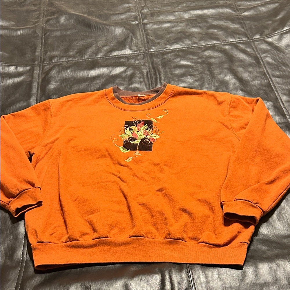 Orange Crewneck Sweater with Floral Design